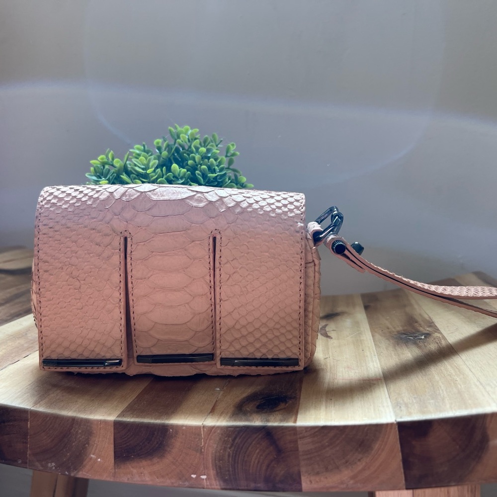 Anthropologie Leifsdottir Peachy Pink Leather Magnetic Snake Print Wristlet